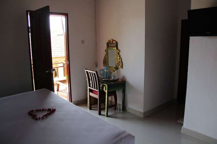 Imagen de la habitación del Hotel Puri Bunga Senggigi. Foto 9