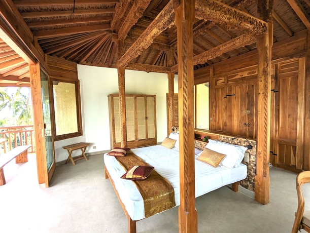 Imagen de la habitación del Hotel Puri Dajuma Terrace Eco-Lodge and Spa. Foto 12