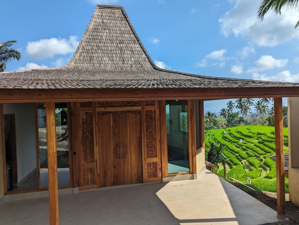 Imagen de la habitación del Hotel Puri Dajuma Terrace Eco-Lodge and Spa. Foto 13
