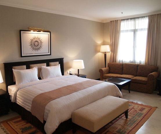 Imagen de la habitación del Hotel Puri Denpasar. Foto 4