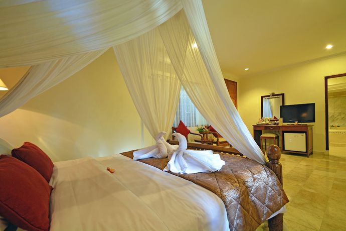 Imagen de la habitación del Hotel Puri Dewa Bharata and Villas. Foto 5