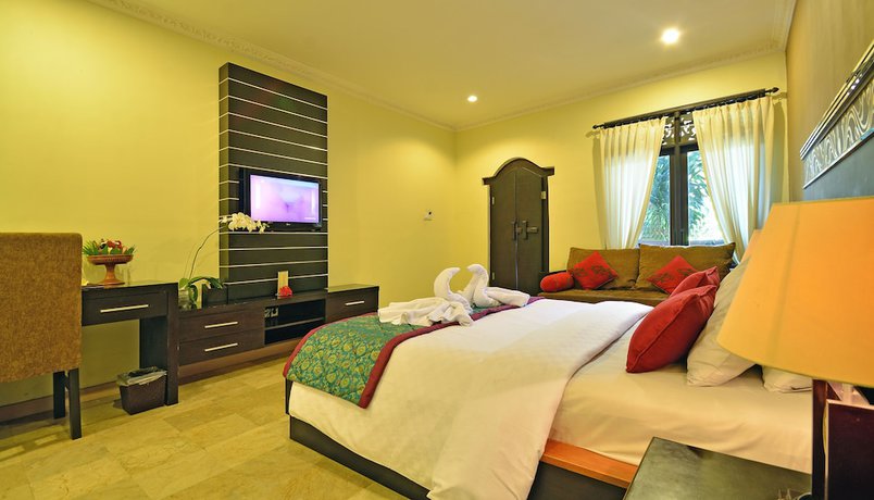 Imagen de la habitación del Hotel Puri Dewa Bharata and Villas. Foto 6