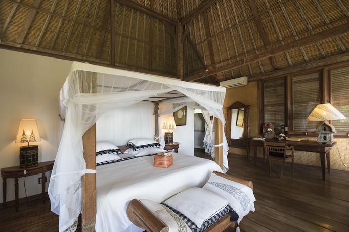 Imagen de la habitación del Hotel Puri Ganesha Villas. Foto 3