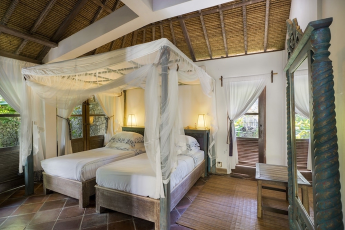 Imagen de la habitación del Hotel Puri Ganesha Villas. Foto 7