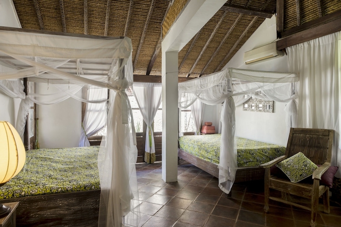 Imagen de la habitación del Hotel Puri Ganesha Villas. Foto 8