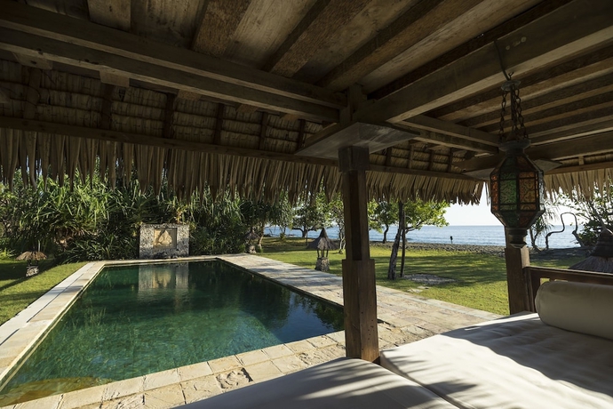 Imagen de la piscina del Hotel Puri Ganesha Villas. Foto 19