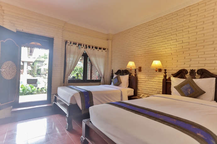 Imagen de la habitación del Hotel Puri Garden 2. Foto 8