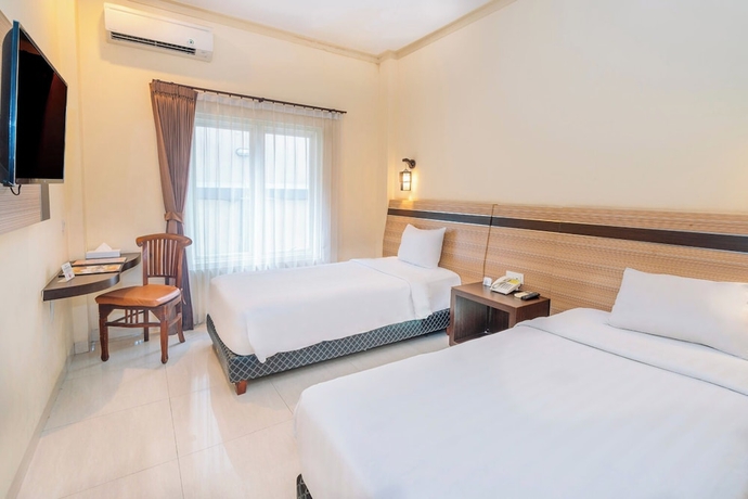 Imagen de la habitación del Hotel Puri Indah Subak. Foto 5