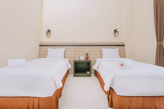 Imagen de la habitación del Hotel Puri Indah Subak. Foto 8