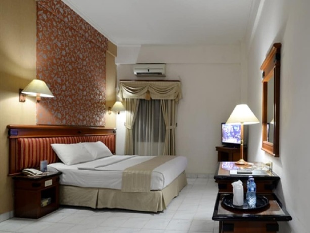 Imagen de la habitación del Hotel Puri Jaya. Foto 8