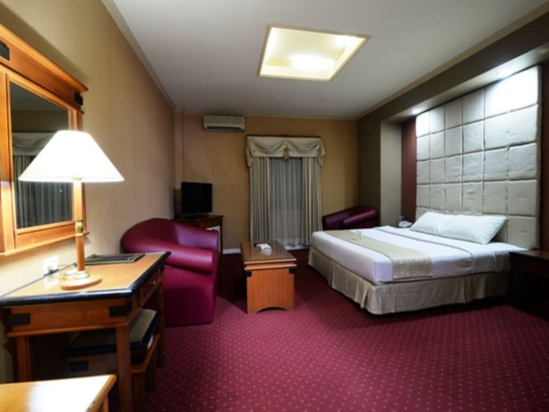Imagen de la habitación del Hotel Puri Jaya. Foto 11