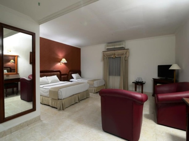 Imagen de la habitación del Hotel Puri Jaya. Foto 14