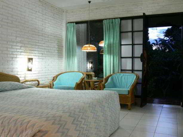 Imagen de la habitación del Hotel Puri Kelapa Garden. Foto 15