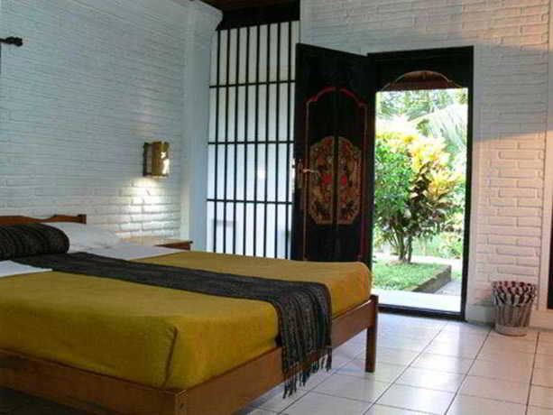 Imagen de la habitación del Hotel Puri Kelapa Garden. Foto 16