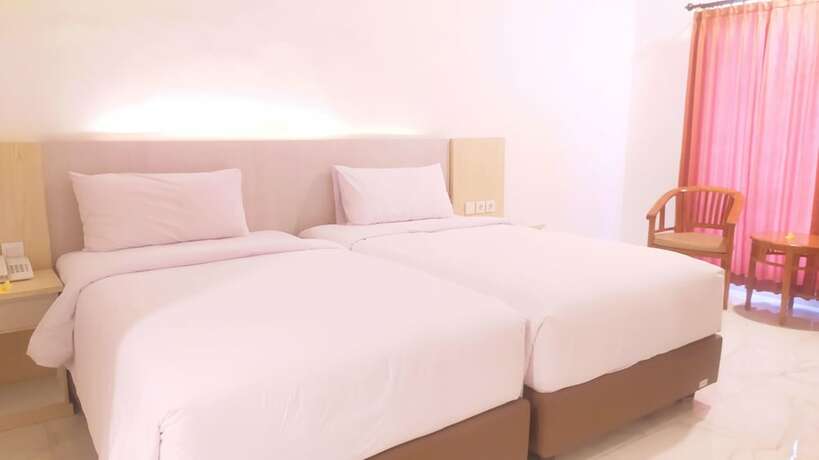 Imagen de la habitación del Hotel Puri Lovina. Foto 19
