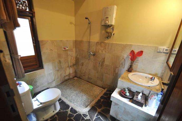 Imagen de la habitación del Hotel Puri Lumbung Cottages, Restaurant and Spa. Foto 4