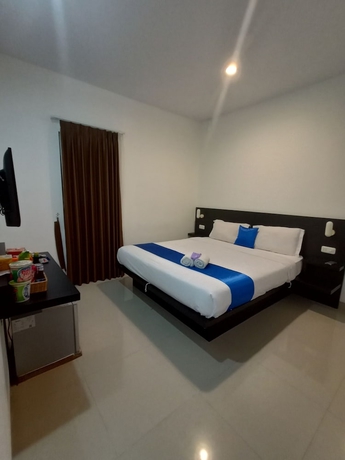 Imagen de la habitación del Hotel Puri Maju. Foto 12