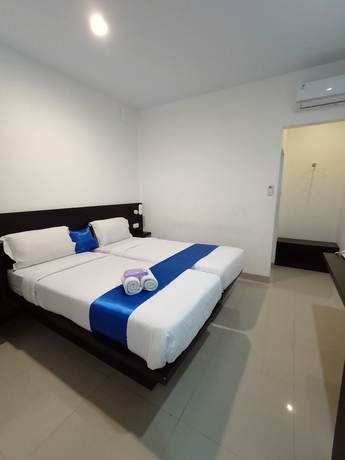 Imagen de la habitación del Hotel Puri Maju. Foto 15