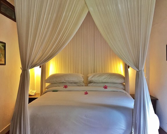 Imagen de la habitación del Hotel Puri Mas Boutique Resorts & Spa. Foto 2