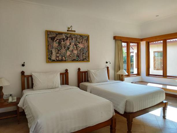 Imagen de la habitación del Hotel Puri Mesari. Foto 13