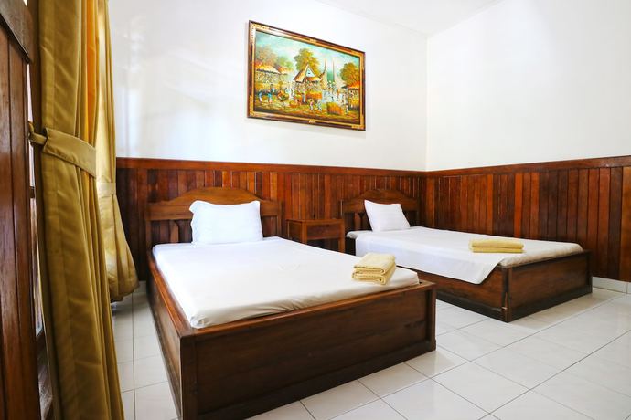 Imagen de la habitación del Hotel Puri Nusa Beach. Foto 8