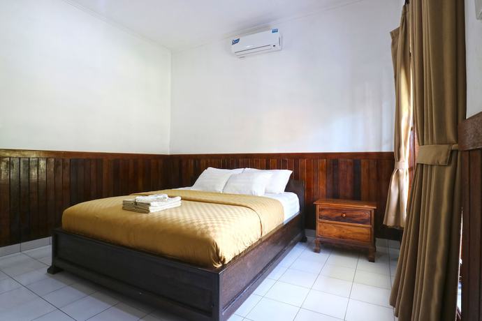 Imagen de la habitación del Hotel Puri Nusa Beach. Foto 14