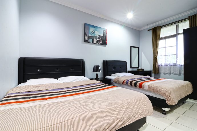 Imagen de la habitación del Hotel Puri Pangalengan. Foto 13