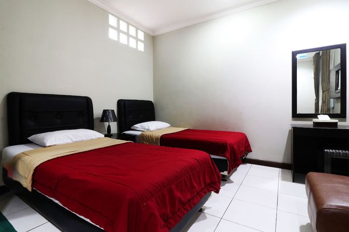 Imagen de la habitación del Hotel Puri Pangalengan. Foto 16