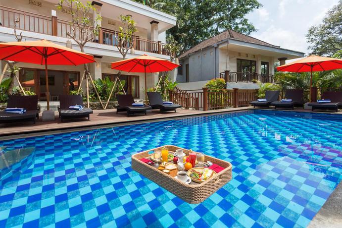 Imagen de la piscina del Hotel Puri Payogan Villa Ubud. Foto 8