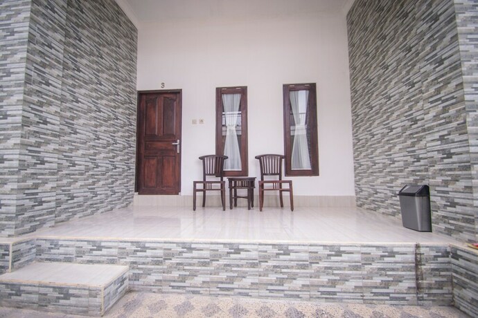 Imagen de la habitación del Hotel Puri Ratu Nusa Penida. Foto 8