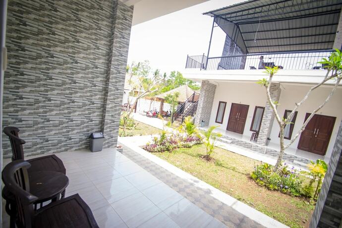 Imagen de la habitación del Hotel Puri Ratu Nusa Penida. Foto 9