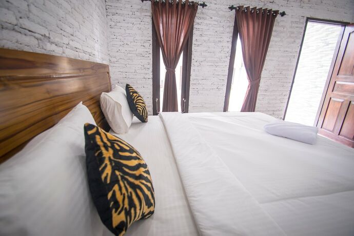 Imagen de la habitación del Hotel Puri Ratu Nusa Penida. Foto 11