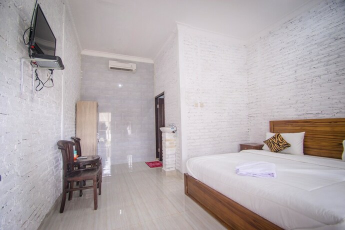 Imagen de la habitación del Hotel Puri Ratu Nusa Penida. Foto 15