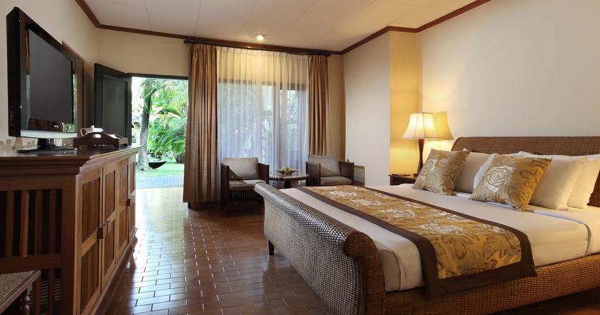 Imagen de la habitación del Hotel Puri Santrian. Foto 14