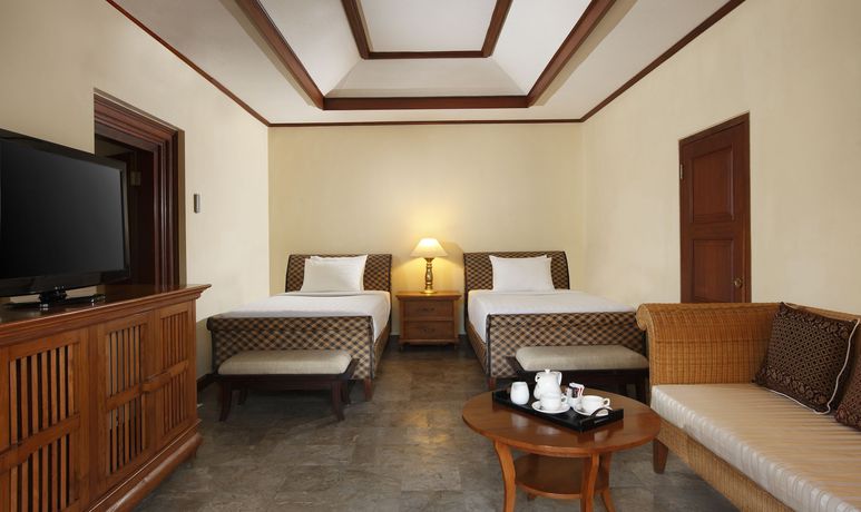 Imagen de la habitación del Hotel Puri Santrian. Foto 15