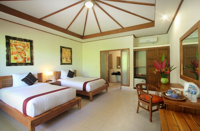 Imagen de la habitación del Hotel Puri Sari Beach. Foto 11