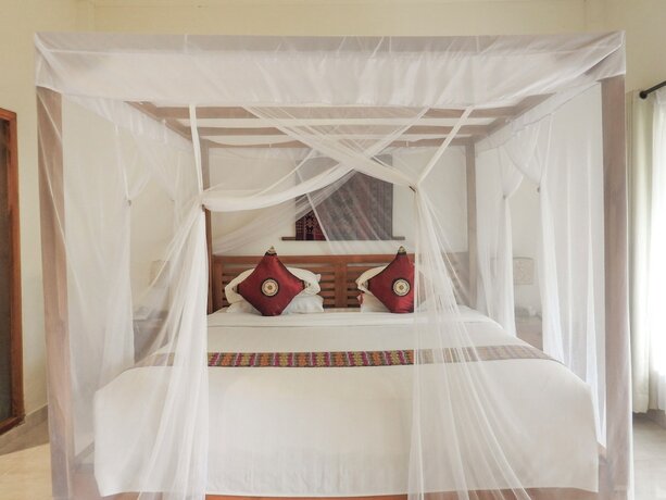 Imagen de la habitación del Hotel Puri Sari Beach. Foto 13