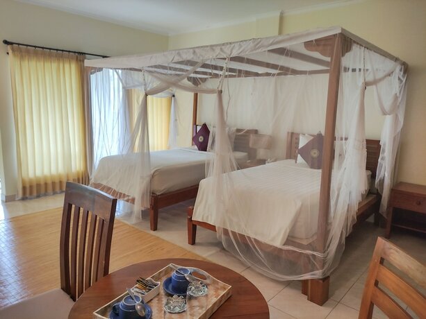 Imagen de la habitación del Hotel Puri Sari Beach. Foto 17