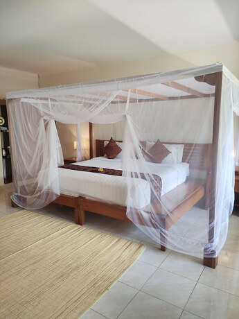 Imagen de la habitación del Hotel Puri Sari Beach. Foto 19