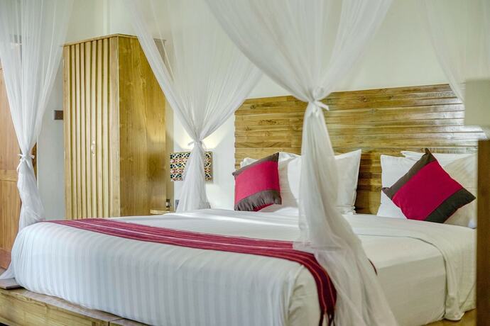 Imagen de la habitación del Hotel Puri Sari Beach. Foto 20