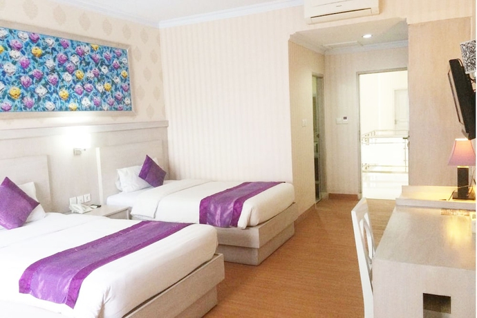 Imagen de la habitación del Hotel Puri Saron Denpasar. Foto 4