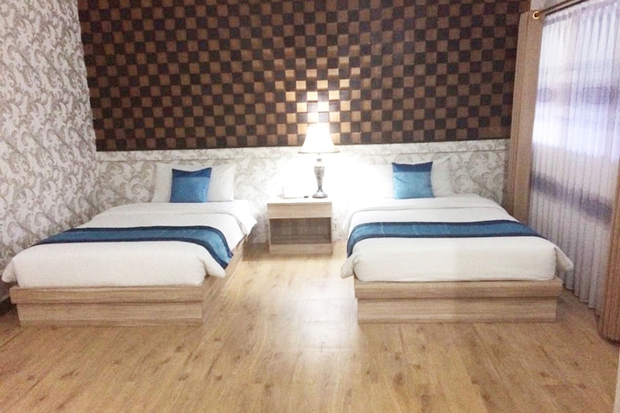 Imagen de la habitación del Hotel Puri Saron Denpasar. Foto 7