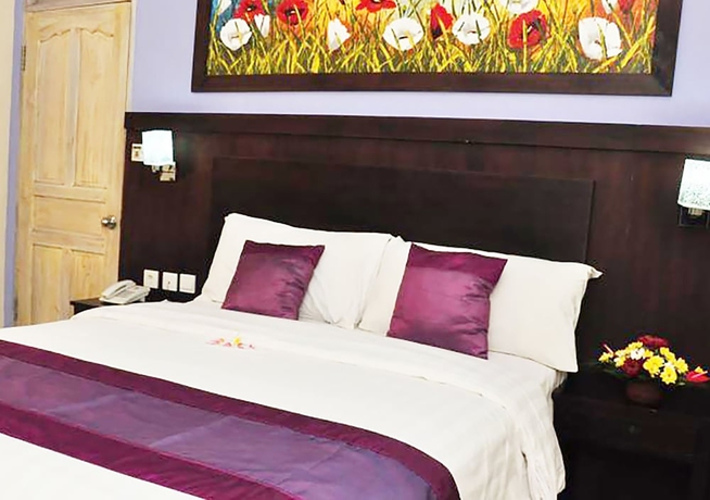 Imagen de la habitación del Hotel Puri Saron Denpasar. Foto 8