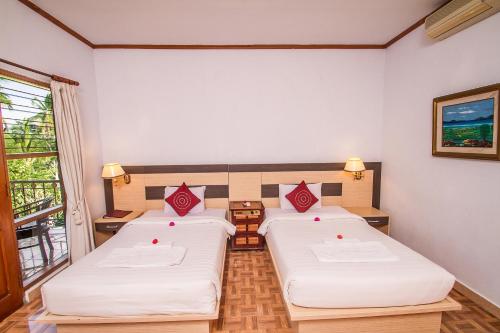 Imagen de la habitación del Hotel Puri Saron Madangan. Foto 2
