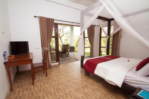 Imagen de la habitación del Hotel Puri Saron Madangan. Foto 4