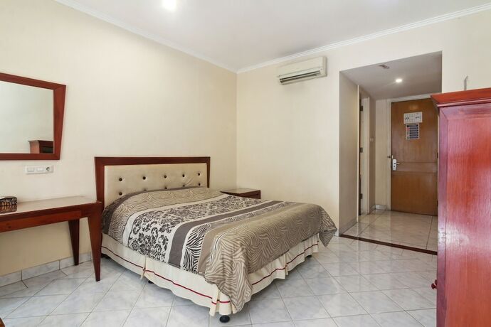 Imagen de la habitación del Hotel Puri Sawo Manila. Foto 17