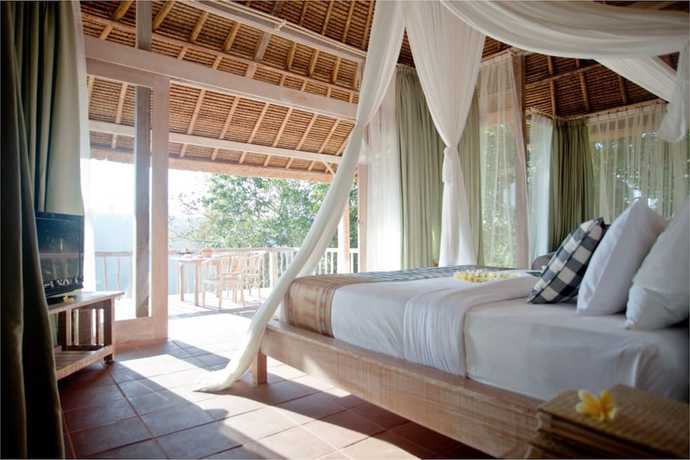 Imagen de la habitación del Hotel Puri Sebatu Resort. Foto 2