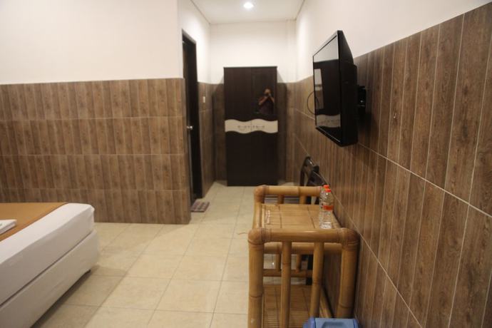 Imagen de la habitación del Hotel Puri Senggigi. Foto 11