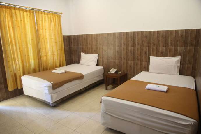 Imagen de la habitación del Hotel Puri Senggigi. Foto 15