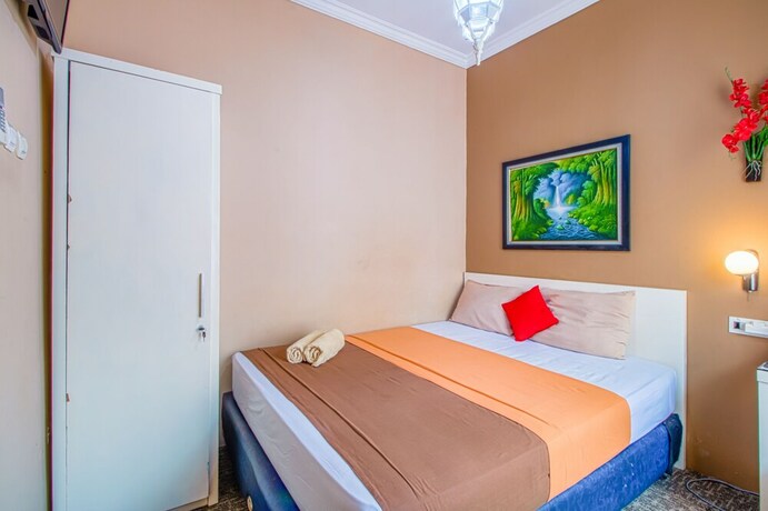 Imagen de la habitación del Hotel Puri Singgasana Ambarukmo. Foto 3